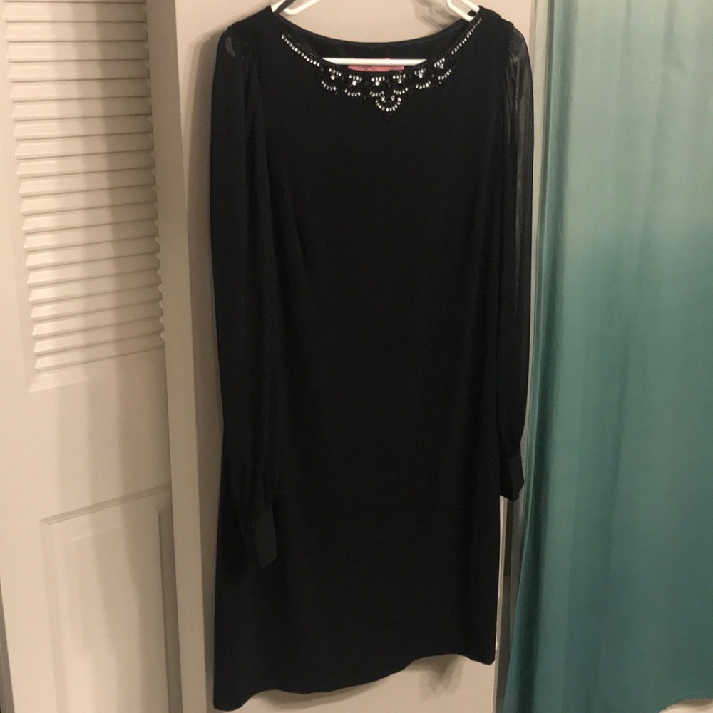 Black cocktail dress with beaded neckline